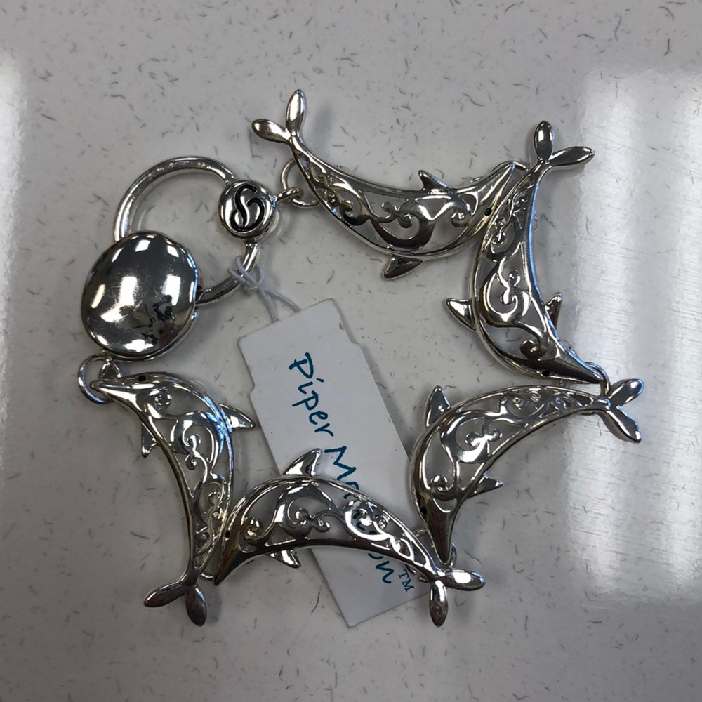 Silver dolphin bracelet by Piper Madison NWT